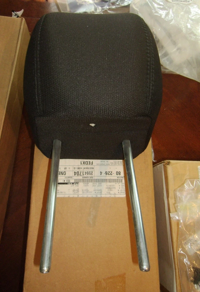 Черный тканевый передний подголовник 25941704 новый от оригинального производителя подлинный GM Traverse 2011-12 - Изображение 1 из 1