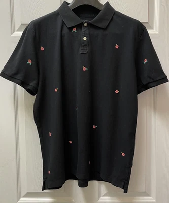 Polo grande Gap para hombre negro con hibisco rosa bordado Foto 1 de 4