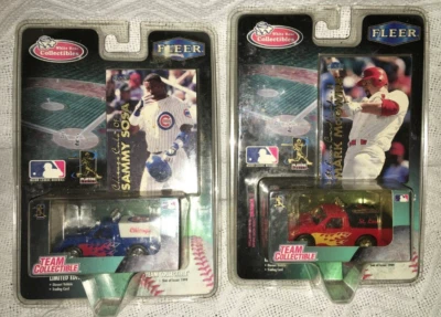 Lot Of 2 1/64 Diecast Vehicle & Fleer Mark McGwire Sammy Sosa Trading Card - Image 1 of 4