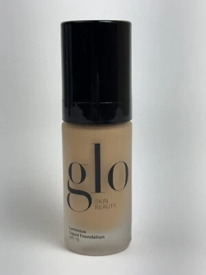 Glo Luminous Liquid Foundation SPF 18 Brulee. Foundation - Image 1 of 3
