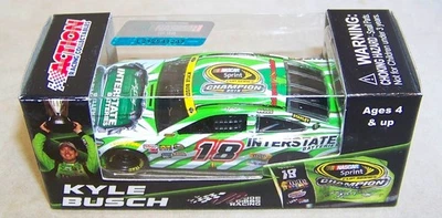 1:64 ACTION 2015 #18 INTERSTATE BATTERIES M&M'S SPRINT CUP CHAMPION KYLE BUSCH - Image 1 of 3