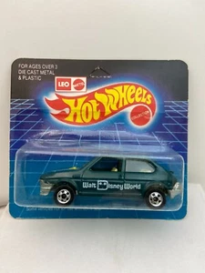 Hot Wheels LEO INDIA FIAT WALT DISNEY WORLD GREEN W/ WHITE WRITING YELLOW ARROW - Picture 1 of 4
