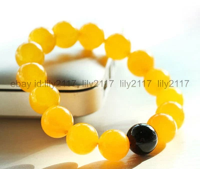 Bonita pulsera elástica natural de 10 mm de jade amarillo negro ágata gemas redondas cuentas Foto 1 de 3