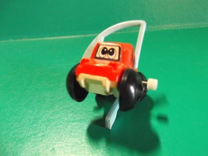 "Coche antiguo con cuerda que se supone que debe hacer medios rollos 2" en TOMY 1978 ""Ver estado" - Imagen 1 de 7