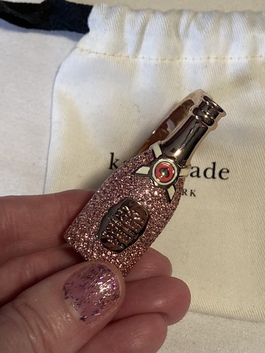 Bracciale Kate Spade Make Magic bottiglia champagne oro rosa mai indossato