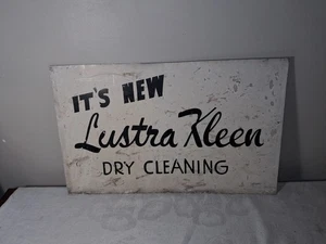 Letrero metálico vintage "It's New Lustra Kleen tintorería" 13,75" por 22" - Imagen 1 de 5
