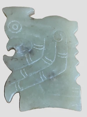 ABSTRACT AND RARE CALEDON JADE CARVING OF A MALE TURKEY. SHANG - W. CHOU,PERIOD. - Image 1 of 3