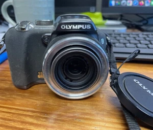 Olympus SP-550 UZ 7.1 MP 28mm Wide Angle 18x Optical Zoom Digital Camera AS-IS - Picture 1 of 2