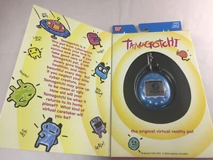 New Bandai Original TamaGotchi Blue & Silver letters 1996 - 1997 English - Picture 1 of 4