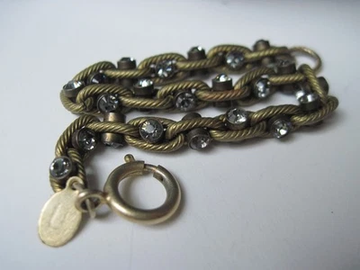 Pulsera de eslabones tono bronce Catherine Popesco con detalles de diamantes de imitación Francia Foto 1 de 4