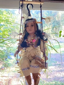 Traditions Doll Collection Porcelain Native American Doll On A Swing 18” Tall - Picture 1 of 4
