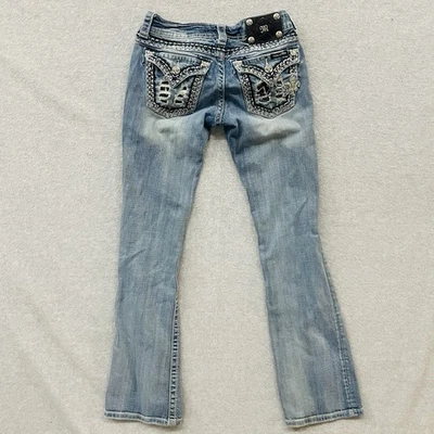 Pantalones de mezclilla Miss Me para mujer 25x31 corte regular corte bota tiro bajo desgastados adornados Foto 1 de 4