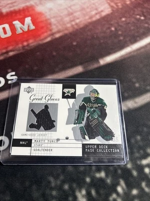 2002-03 Upper Deck Mask Collection Great Gloves Jersey Marty Turco #MT - Image 1 of 3