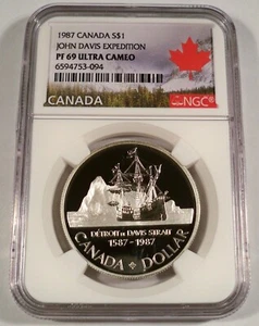 1987 NGC PF69UCAM CANADA SILVER DOLLAR JOHN DAVIS EXPEDITION S$1 ULTRA CAMEO - Picture 1 of 4
