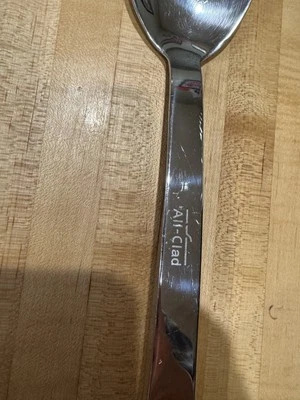 Cuchara de acero inoxidable totalmente revestida - Usada Foto 1 de 2