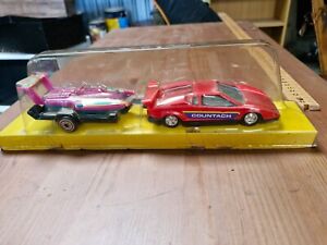 Tootsie Toy Lamborghini Countach Diecast Vehicle and boat in plastic