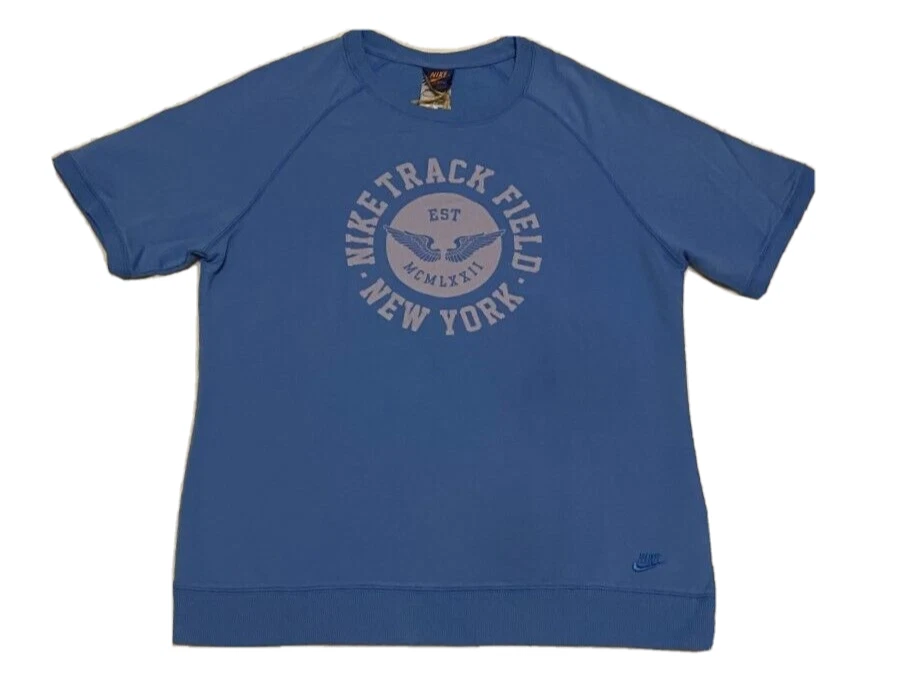 Nike NOVA Camisa Feminina Exclusiva Trashed Individual Track & Field Azul Grande $80 - Imagem 1 de 1