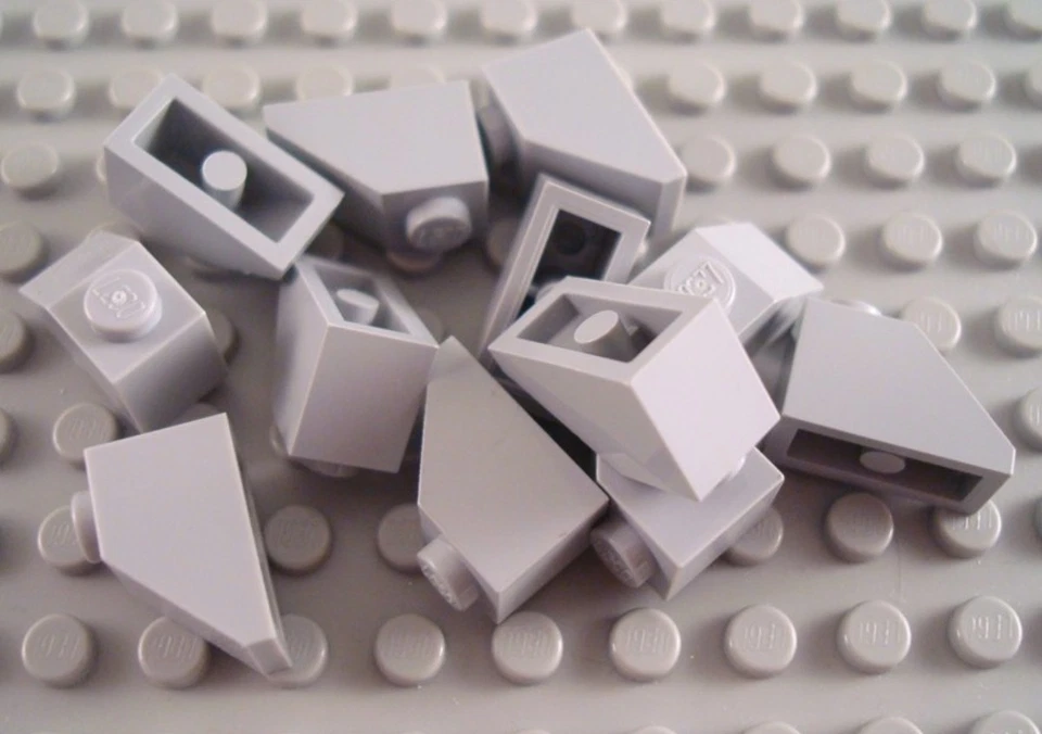 LEGO Lote de 12 piezas de techo inclinado gris azulado claro 2x1 Foto 1 de 1