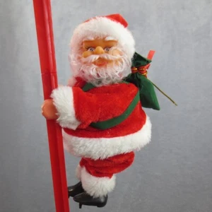 Leiterklettern Weihnachtsmann geht auf und ab singt Jingle Bells Weihnachten Urlaub - Bild 1 von 9
