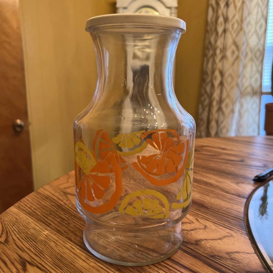 Jarra jarra de jugo de naranja Anchor Hocking vintage EE. UU. con tapa Foto 1 de 4