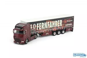 Tekno Fernfahrer 40 Jahre DAF XG+ Planenauflieger 86038 - Bild 1 von 5