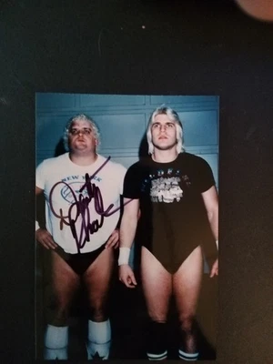 Foto brillante NWA GCW Dusty Rhodes y Tommy Rich 4x6 firmada por Dusty Foto 1 de 4