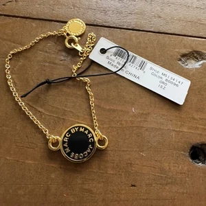Marc by Marc Jacobs Gold Tone Black Enamel Logo Charm Bracelet - Picture 1 of 2