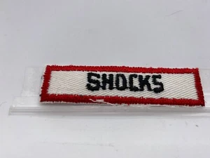 SHOCKS NUEVO BORDADO HIERRO EN PARCHE CON NOMBRE 3/4 X 3 - Imagen 1 de 1
