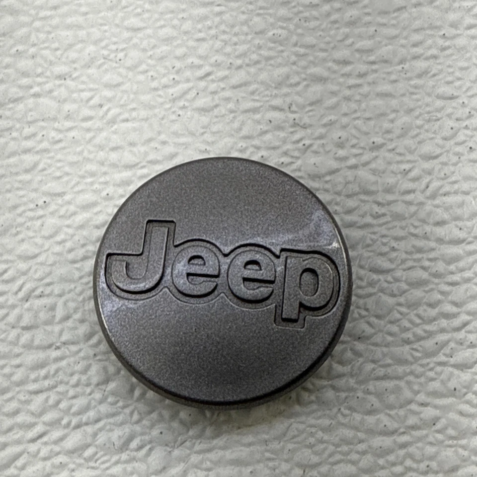 Tapacubos gris OEM 1997-2001 Jeep Cherokee XJ Wrangler llanta (1) Foto 1 de 4
