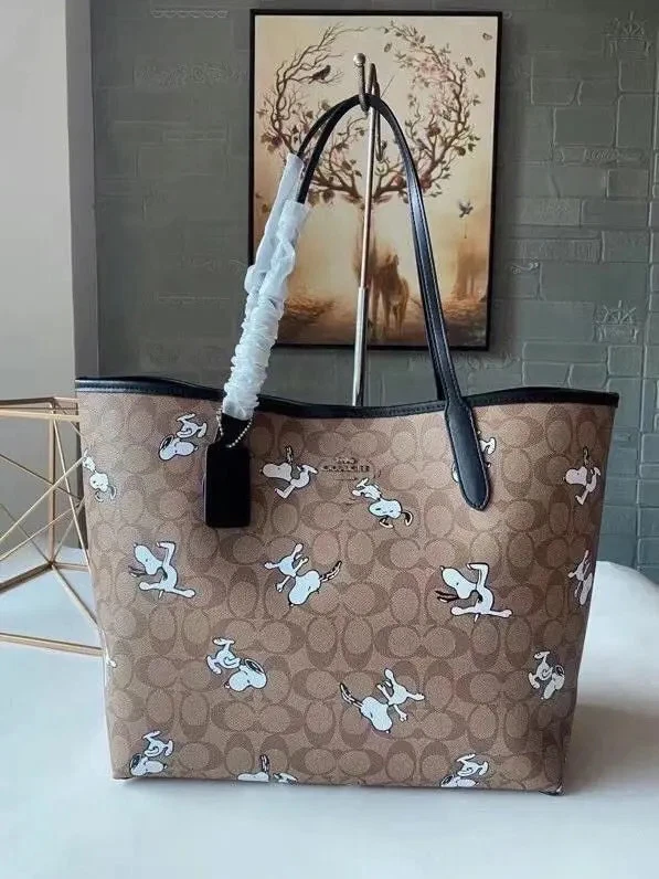 COACH x PEANUTS City Tote Bag Signature Coated Canvas Snoopy CBJ89 Outlet