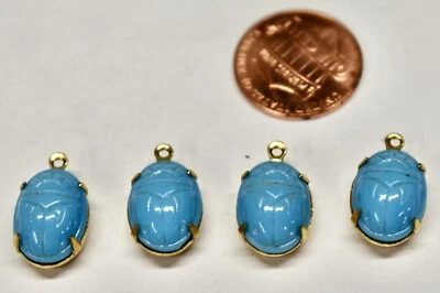 VINTAGE 4 TURQUOISE BLUE SCARAB DOMED RELIEF GLASS OVAL PENDANTS • 10x14mm - Image 1 of 2