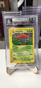 Beckett 8,5 casi como nuevo + Vileplume Holo 31/165 Pokémon 2002 expedición - Imagen 1 de 2