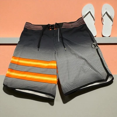 Bañador Hurley para hombre a rayas naranja negro blanco talla 34 Foto 1 de 4