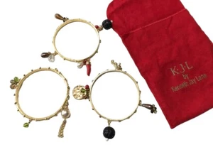 KJL KENNETH JAY LANE Bracelet Gold Tone Charm Dangle Tassel Bangle Set Ethnic - Picture 1 of 15