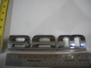 DODGE RAM LETTER SCRIPT EMBLEM SYMBOL USED BAGDE CHROME OEM ORIGINAL - Picture 1 of 1