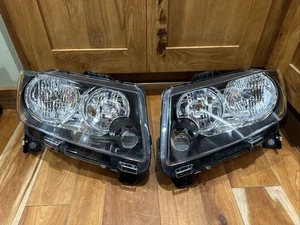 Par de faros halógenos para Jeep Grand Cherokee 2011-2013/2011-17 brújula negro - Imagen 1 de 8