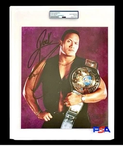 WWE THE ROCK SIGNED 8X10 WRESTLING CHAMPIONSHIP PHOTO ENCAPSULATED BY PSA COA - Picture 1 of 3