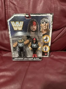 NUEVO EN CAJA FIGURA DE LUCHA LIBRE WWE MATTEL RETRO SERIE 14 NUEVO Y NUEVO HULK HOGAN & SYXX WWF - Imagen 1 de 3