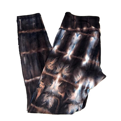 Leggings desgastados corte láser tie dye nuevos con etiquetas.  Foto 1 de 4