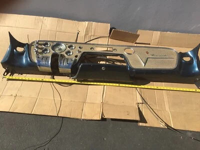 1956 Packard Caribbean Dashboard Gold Color with instruments and some switches.  - Image 1 of 4