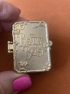 DELIGHTFUL DISNEY BEAUTY & THE BEAST PIN BOOK PIN OPENS DISNEY PARKS VGC PARIS - Picture 1 of 5