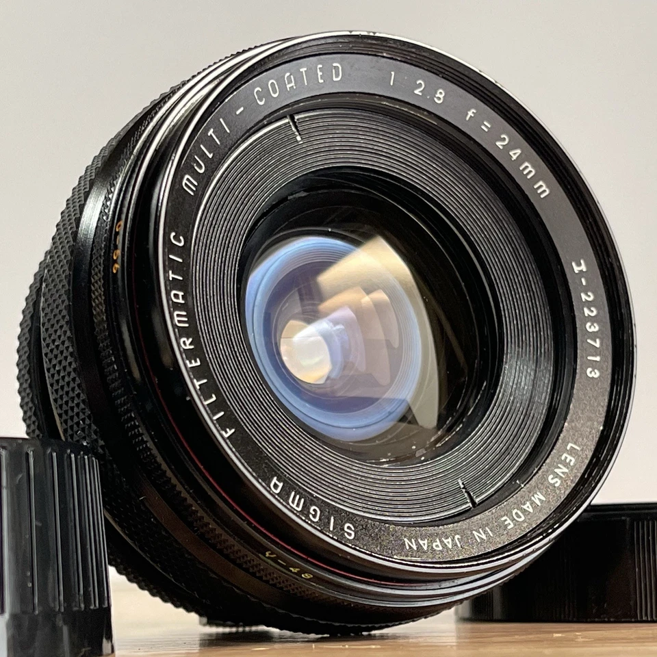 [Exc-] Sigma Filtermatic Multi-Coated 24mm f2.8 Fish Eye MF Lens for Olympus G - Image 1 of 4