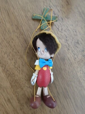 Adorno navideño marioneta de madera vintage de Pinocho Foto 1 de 4