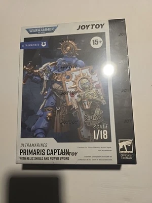 JOYTOY Warhammer40K Ultramarines Primaris Capitão com Escudo de Relíquia - Imagem 1 de 3