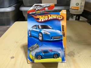 HOT WHEELS 37 NISSAN 370Z WITH FAST FISH KEYCHAIN - Picture 1 of 2