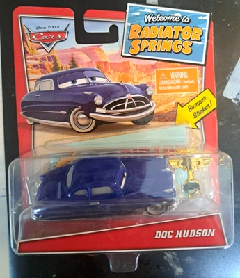 CARS - RADIATOR SPRINGS DOC HUDSON + Piston Cup - Mattel Disney Pixar - Immagine 1 di 2