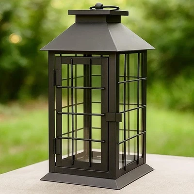 Linterna de vela decorativa rústica seráfica de 11" - vintage de metal y vidrio negra  Foto 1 de 4