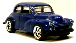 LOOSE 2024 MATCHBOX 1:64 DARK BLUE MORRIS MINOR SALOON WHEEL SWAP REAL RIDERS - Picture 1 of 9