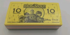 Disney Pixar Monopoly Geldpaket Ersatzteile versiegelt - Bild 1 von 2