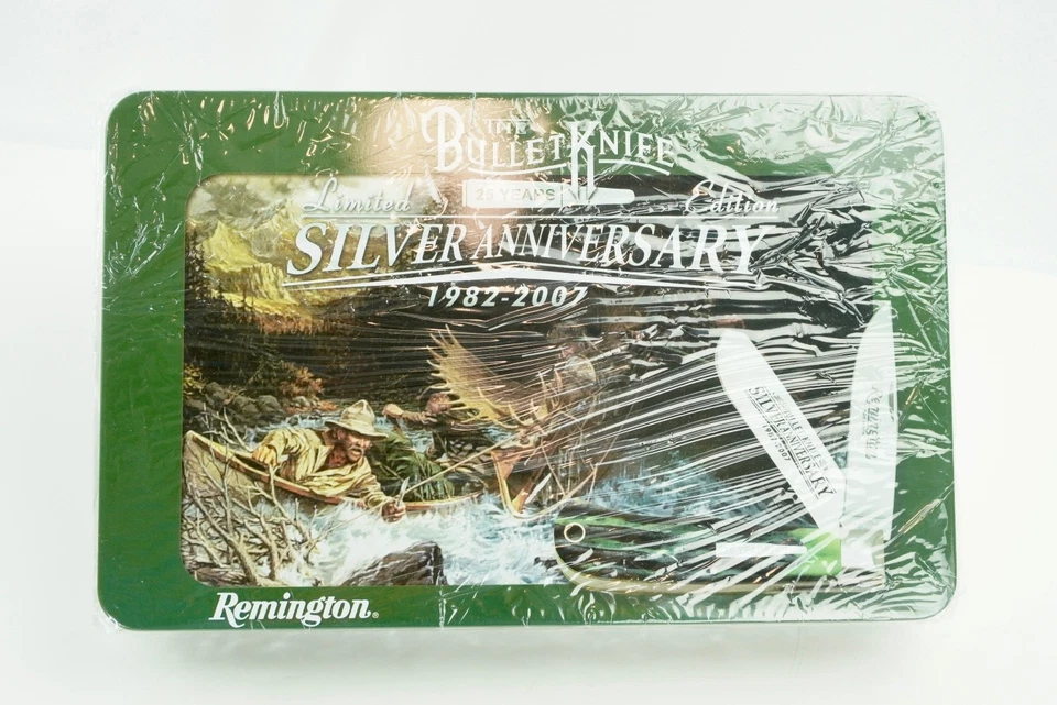 Cuchillo bala aniversario plata Remington 1982-2007 todavía en envoltura Foto 1 de 1